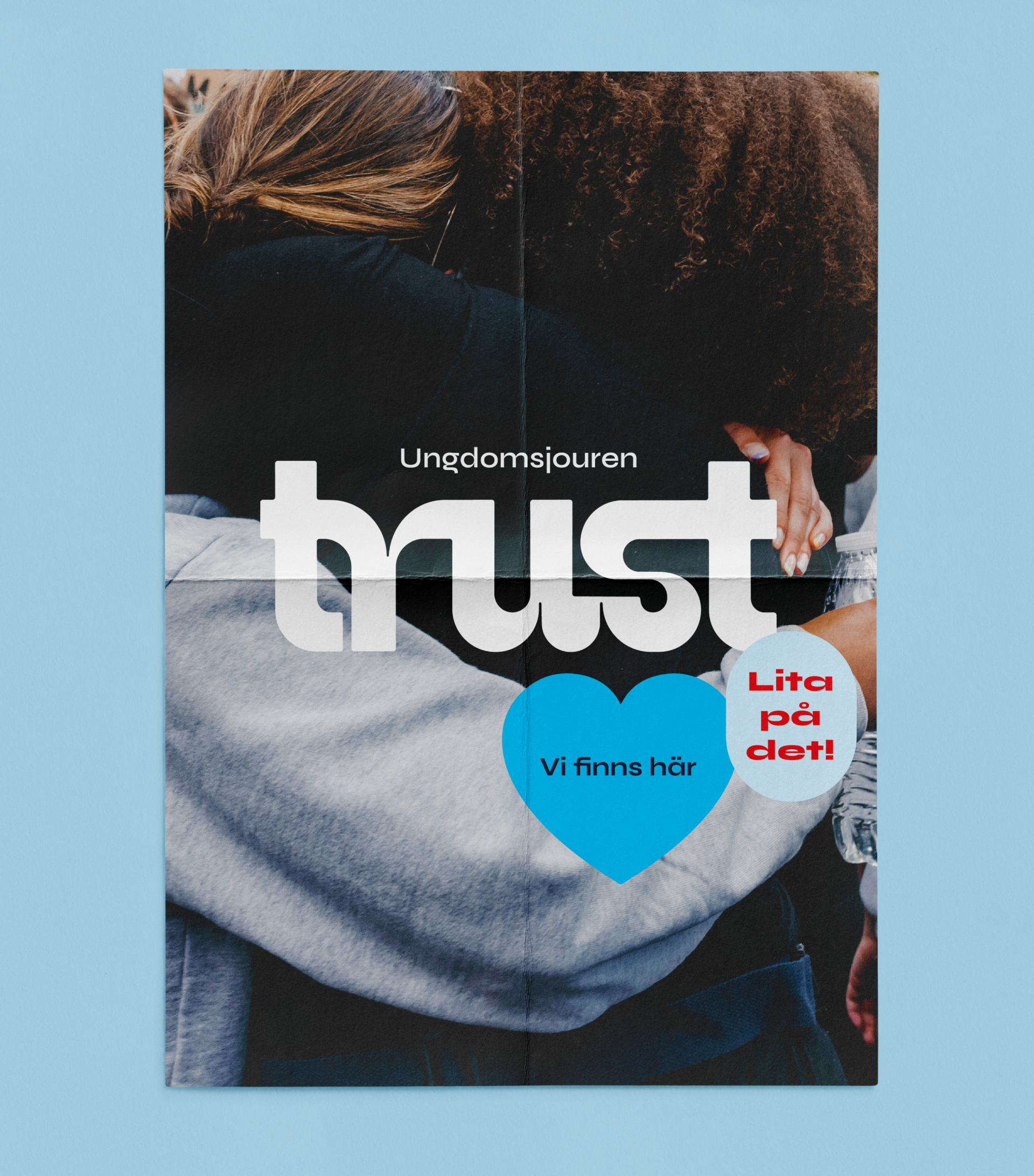 Bild på poster designad för ungdomsjouren trust. Texten i bilden säger Vi finns här, lita på det!